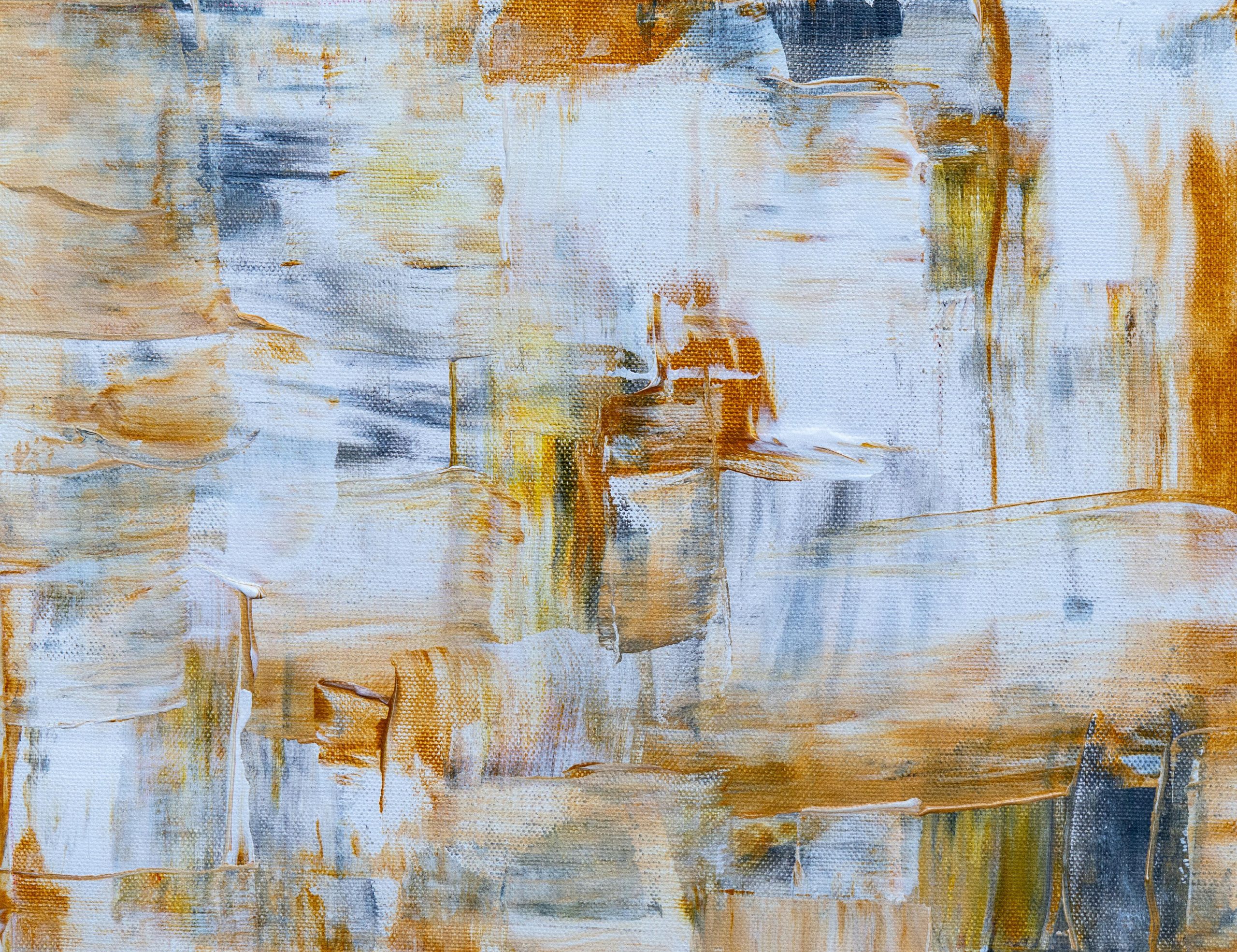 Vibrant abstract painting showcasing expressive brushstrokes in warm earth tones, perfect for modern decor.